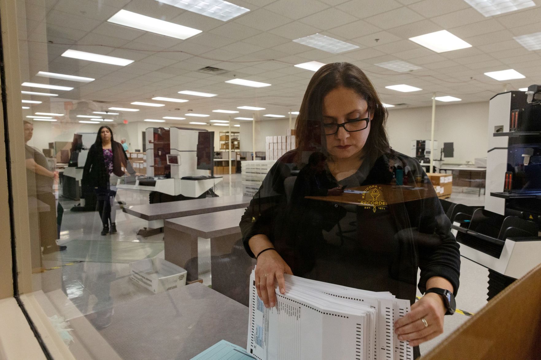 FILE PHOTO: Voters cast their ballot in the Democratic primary in Sun City